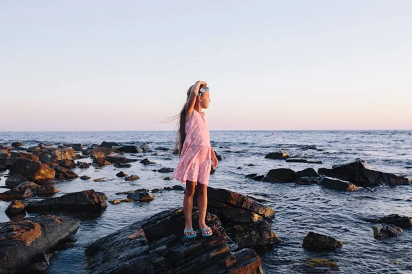 Portrait of a cute girl in a pink dress — Stock Photo, Image