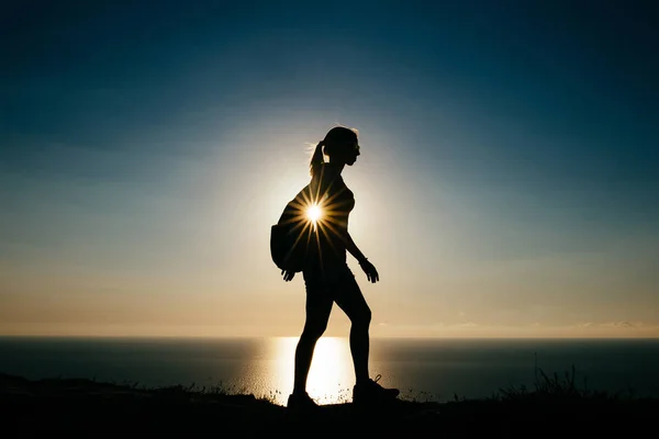 Young woman tourist with backpack — Stock Photo, Image