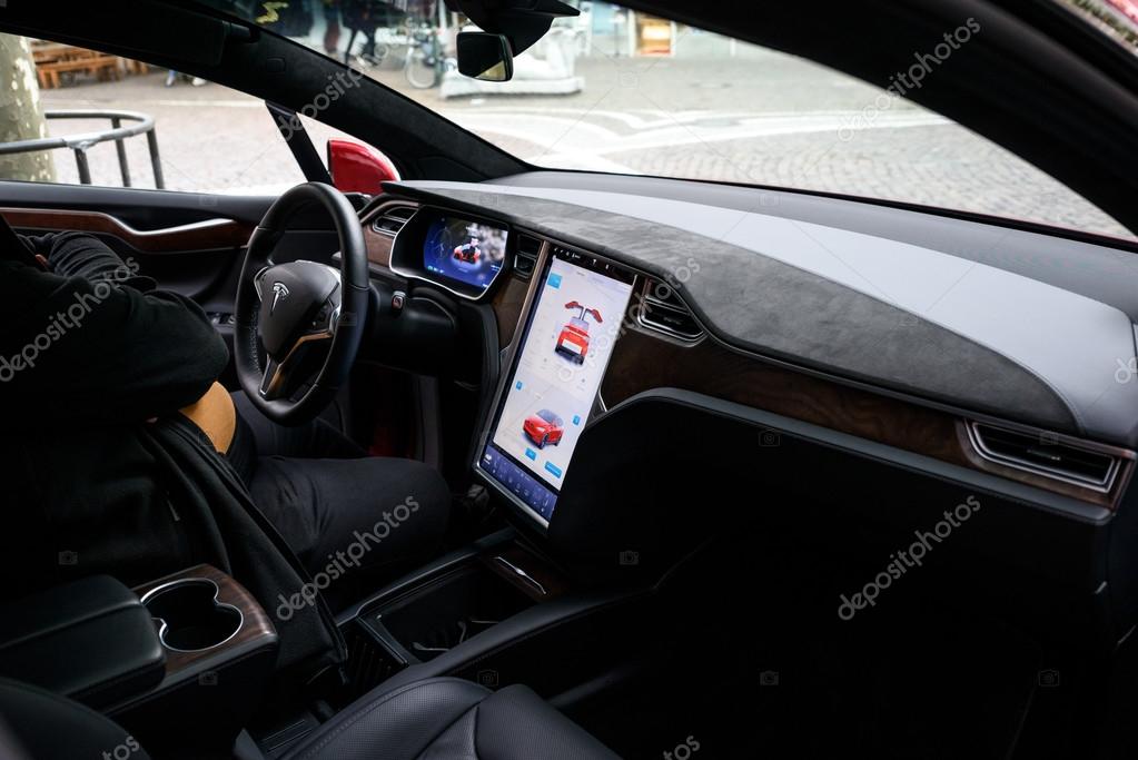 FRANKFURT, GERMANY - OCTOBER 08, 2016: Tesla machine shop in Frankfurt center. Tesla is an American public company designs, manufactures, and sells electric car