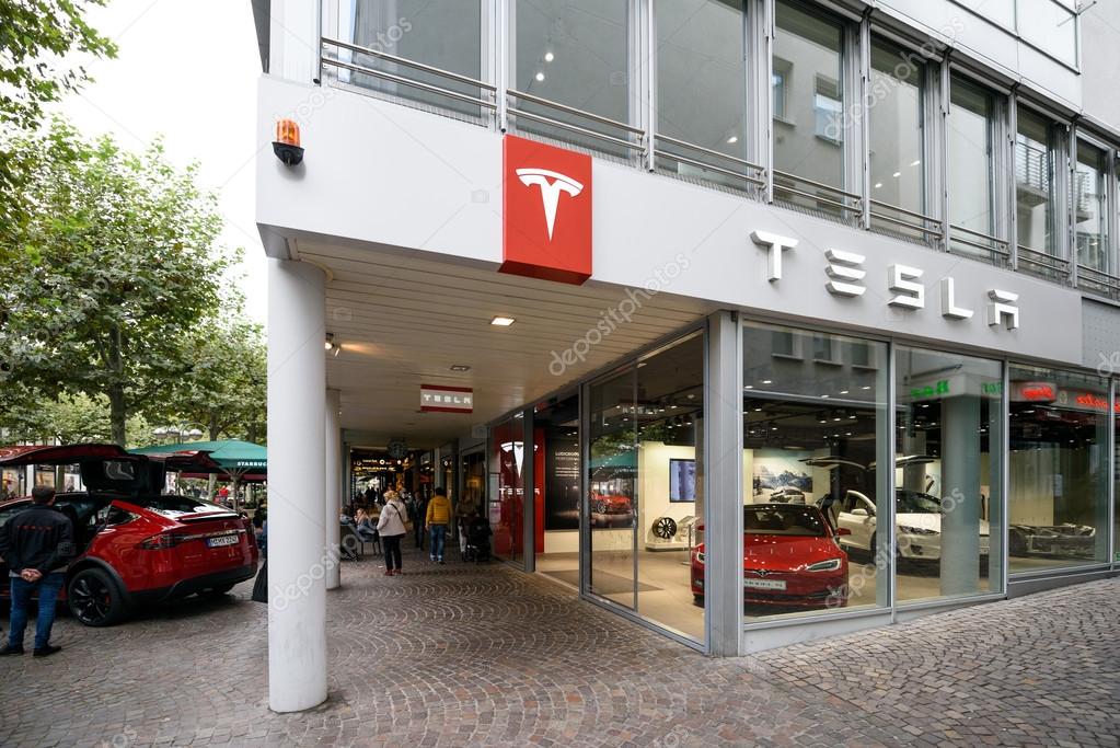FRANKFURT, GERMANY - OCTOBER 08, 2016: Tesla machine shop in Frankfurt center. Tesla is an American public company designs, manufactures, and sells electric car