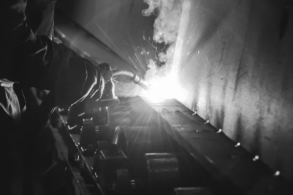 Steel cutting process with gas. Oxy-fuel cutting are processes that use fuel gases and oxygen to weld and cut metals, respectively, monochrome