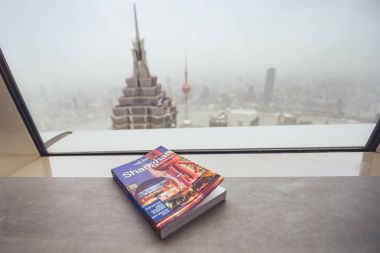 Lonely Planet travel book, Shanghai, China clipart