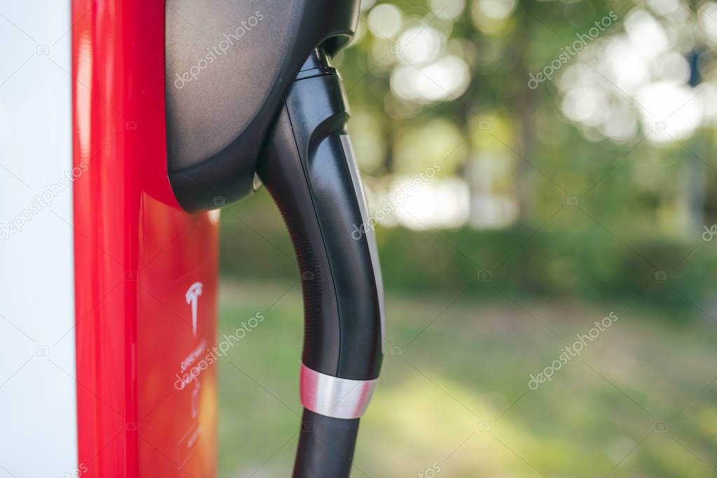 KATOWICE, POLAND - AUGUST 26, 2017: Closeup of Tesla Supercharger. Tesla motors develops network of the charging stations across Europe and World