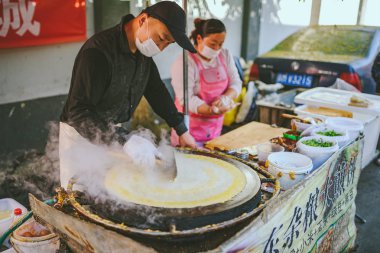 Pancekes, Pekin, Çin yapma Steet satıcılar