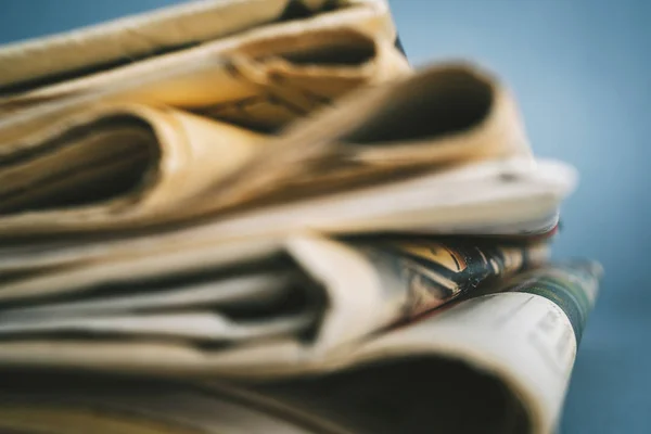 Newspapers Blue Background Macro View — Stock Photo, Image
