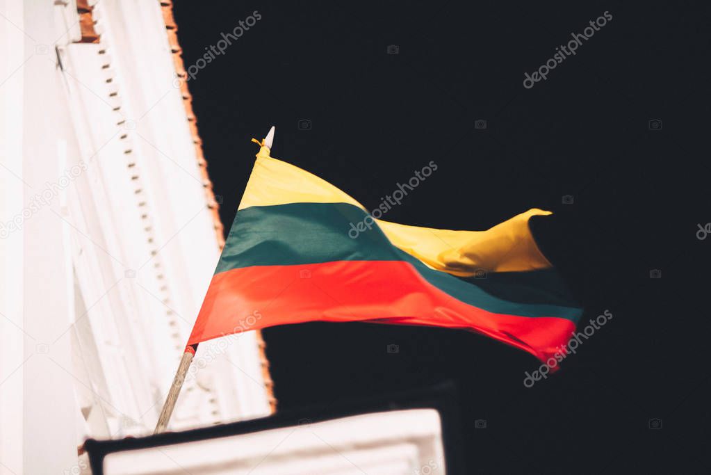 Closeup view of Lithuanian flag in the wind. Lithuania celebrating 100-year independence anniversary