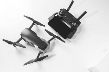 KAUNAS, LITHUANIA - MARCH 03, 2018: newest DJI Mavic Air drone on white background clipart