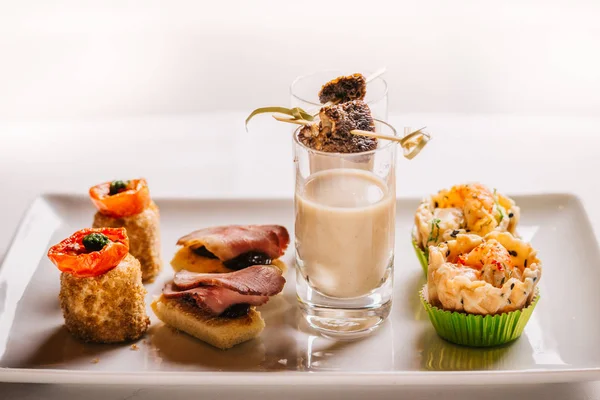 Sweet appetizers on tray — Stock Photo, Image