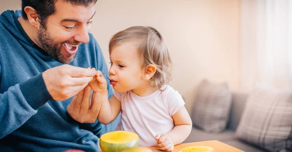 Close Young Happy Father Holding Spoon Feeding Cute Little Girl — Stock Photo, Image