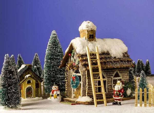 Yeni yıl Noel ev kar figür Noel Baba ile dekore edilmiştir.