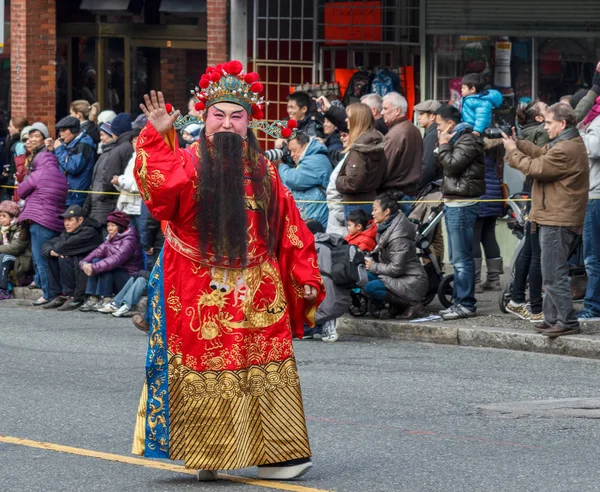 VANCOUVER, CANADA - 2 de fevereiro de 2014: Personagem Chinês lidera o Desfile do Ano Novo Lunar em Vancouver Chinatown . — Fotografia de Stock