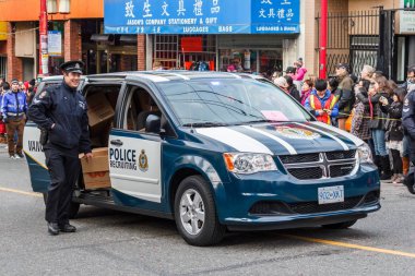Vancouver, Kanada - 2 Şubat 2014: Memur, Vancouver polis departmanı, Çin yeni yılı geçit töreni.