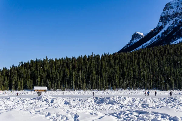 LAKE LOUISE, CANADA - MARCH 20, 2020: rocky mountains around frozen lake louise winter wonderland — Stock Image Lake Louise Canada March 2020 Rocky Mountains Frozen Lake Louise Royalty Free Stock Images