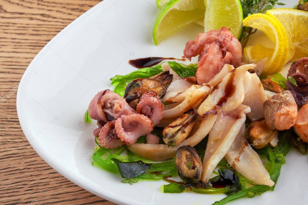 shrimp and Octopus on a white plate