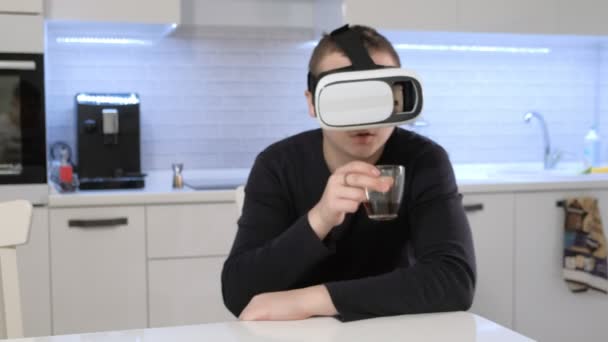 Man Wearing VR Headset at kitchen. Using Gestures with Hands. — Stock Video