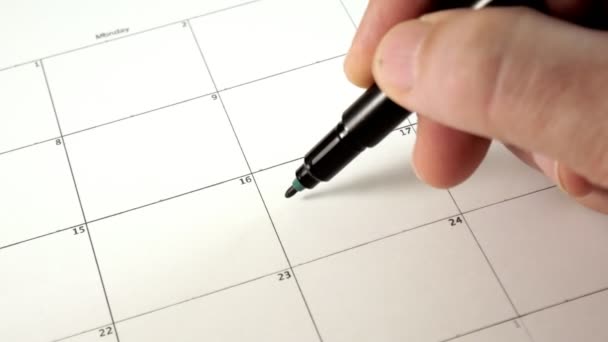 Assine o dia no calendário com uma caneta, desenhe um bom dia ruim — Vídeo de Stock