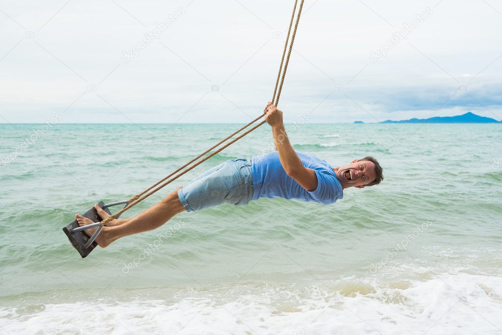  funny man on the beach swing