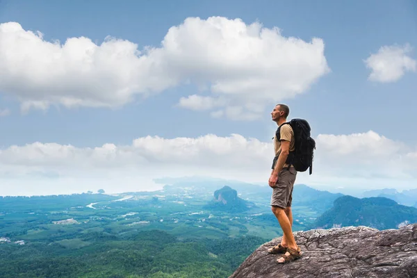 Hiker with backpack standing and enjoying a beautiful nature — Stock Photo, Image