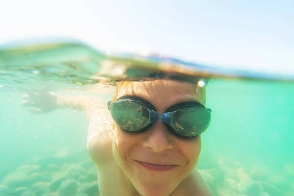 Underwater portrait of smiling boy — Stock Photo, Image