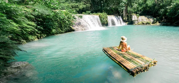 Woman Bikini Hat Sitting Bamboo Raft Enjoying View Waterfall Travel — Stock Photo, Image