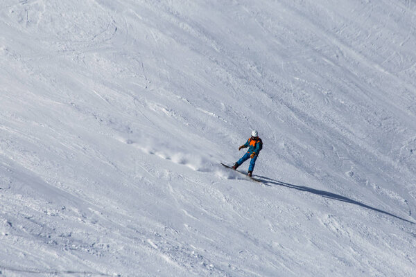Snowboard, skier rider on mountains. Extreme snowboard freeride sport. Solden, Alps, Austria