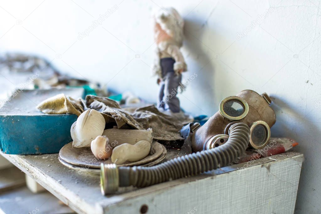 Gas masks on the floor in the middle school in Pripyat, Chernobyl exclusion zone. Nuclear catastrophe