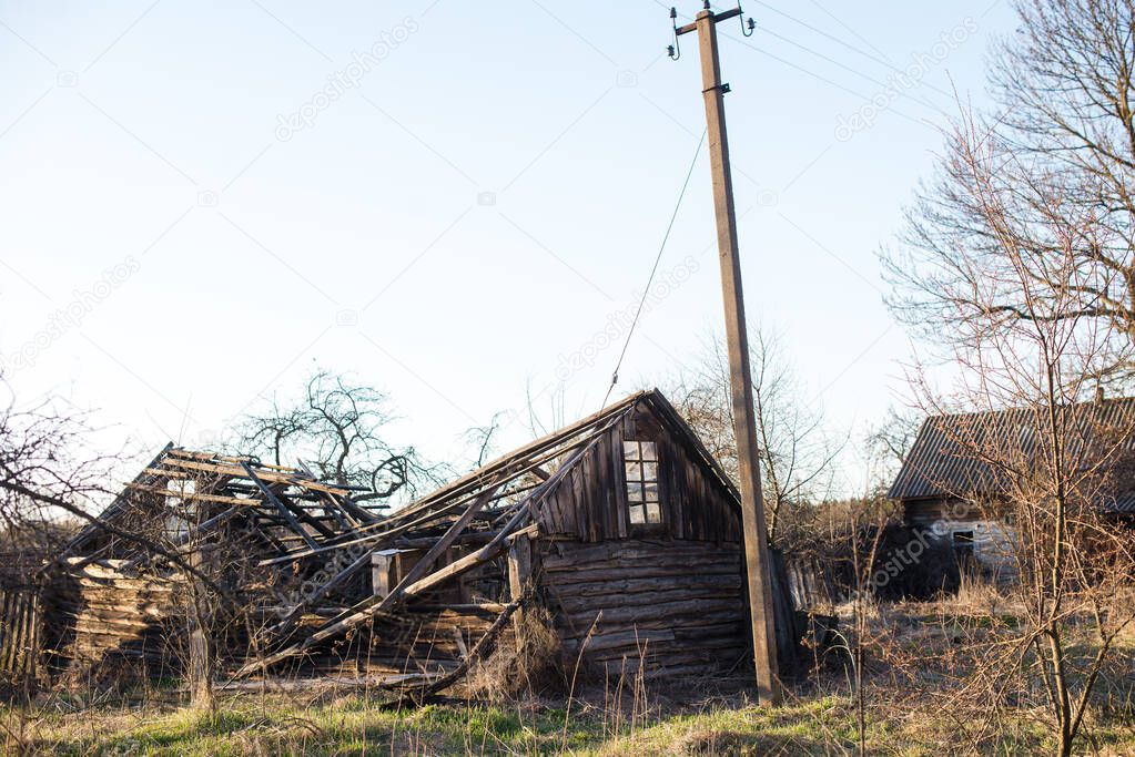 abandoned wooden house in a dead village in the Chernobyl exclusion zone