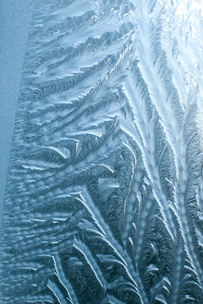 Frosty patterns on glass in winter — Stock Photo, Image