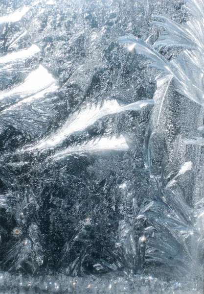 Frosty patterns on glass in winter — Stock Photo, Image