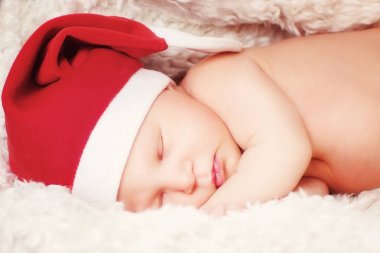Bir Santa Claus şapka bir bebek