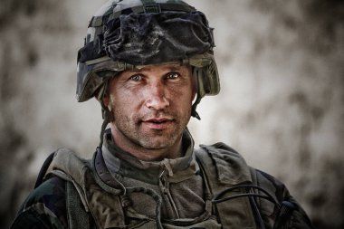 Kabul, Afghanistan - circa, 2011. Legionnaire is on duty during a combat mission in Afghanistan. clipart