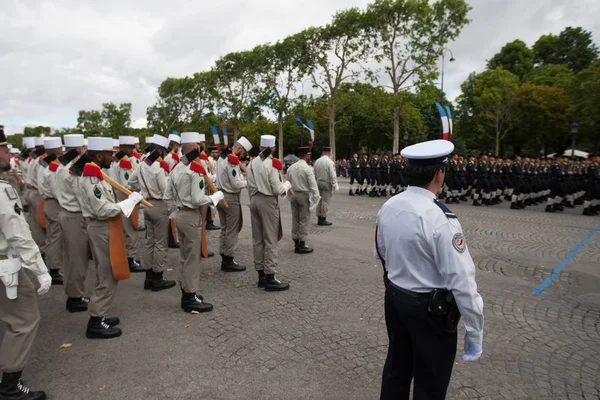 Paris, France - July 14, 2012. The procession of legionnaires during the military parade on the Champs Elysees in Paris. — Stock Photo, Image