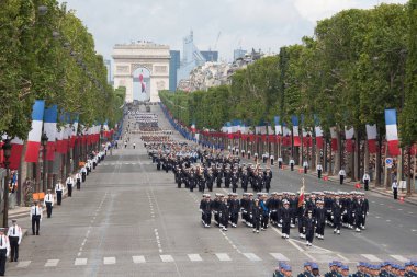 Paris, France - July 14, 2012. Soldiers from the French Foreign Legion march during the annual military parade . clipart