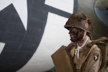 France, Normandy, June 6, 2011 - Mannequin of the American paratrooper during the landing of the Allies in Normandy. clipart