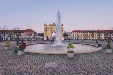 Brandenburg Gate and fountain in Potsdam clipart
