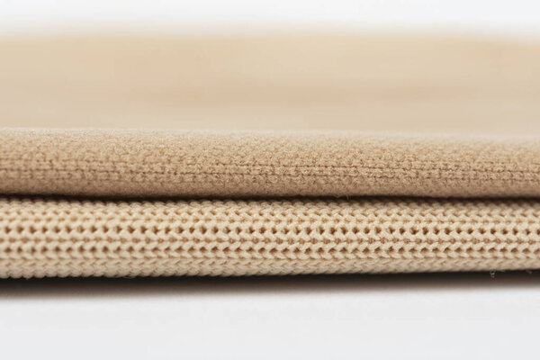 крупным планом Компрессионная одежда для лимфедемы, отека и липедемы - разница между плоским вязанием и круглым вязанием
