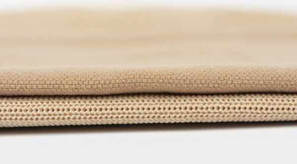 крупным планом Компрессионная одежда для лимфедемы, отека и липедемы - разница между плоским вязанием и круглым вязанием
