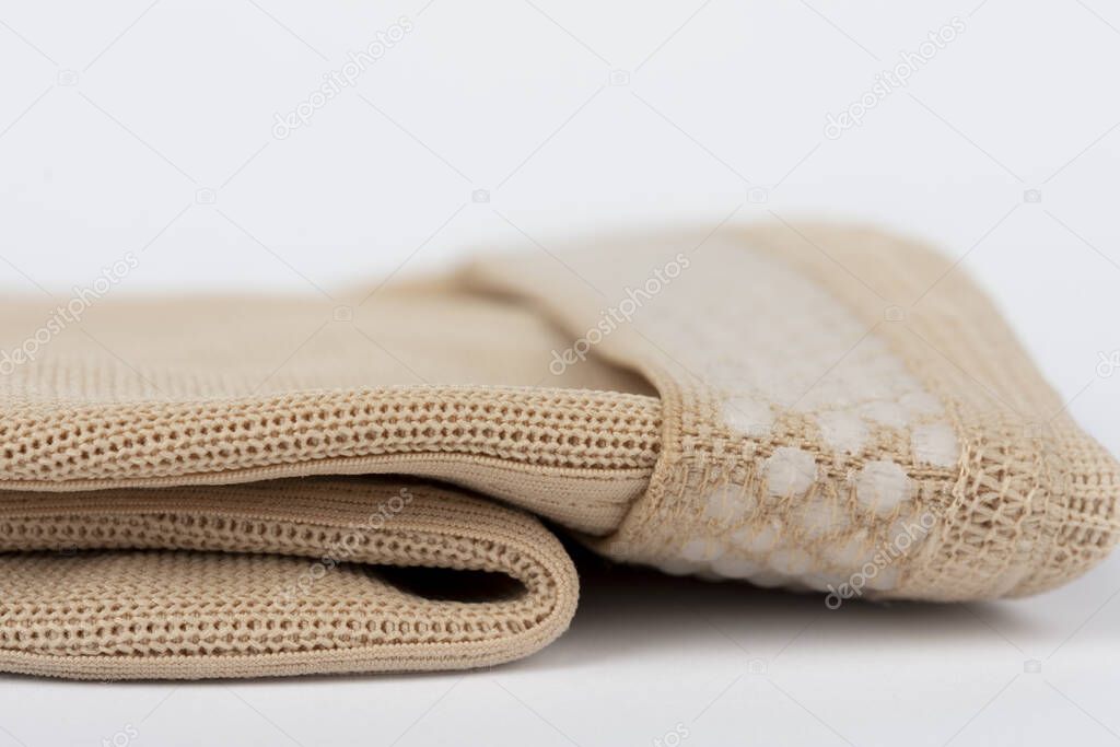 Close up of flat knit Graduated Compression Garments for leg lymphedema, edema and lipedema - powerful compression stocking for greater edema containment