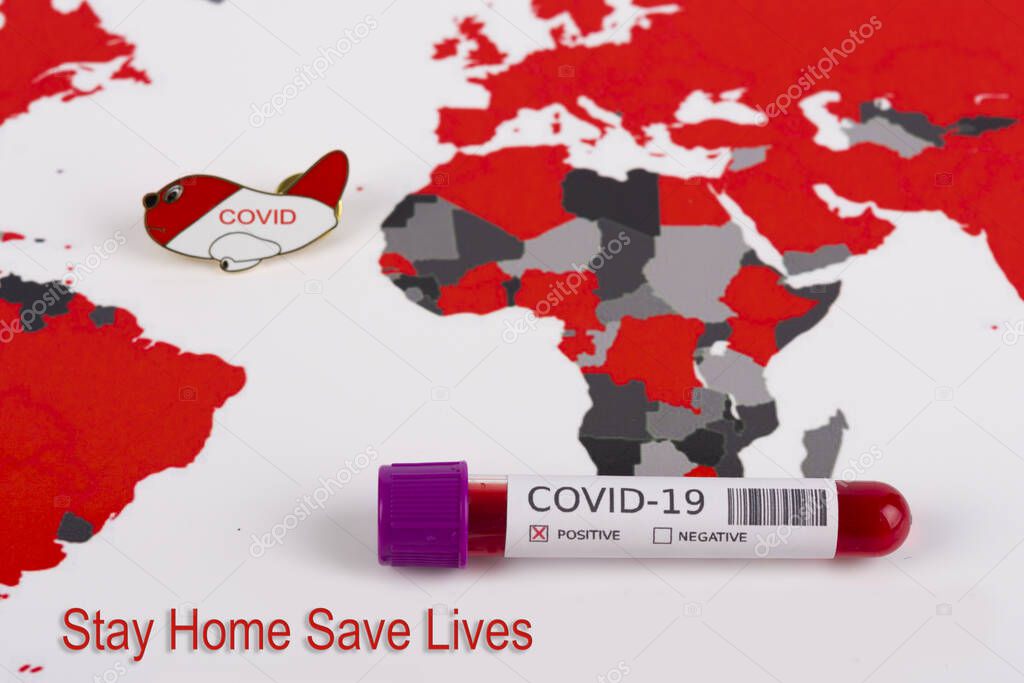 Coronavirus and travel concept. Coronavirus outbreak, epidemic in Wuhan, China. Travel restrictions and quarantine. Blood sample in a tube on a world map showing countries with COVID-19 cases