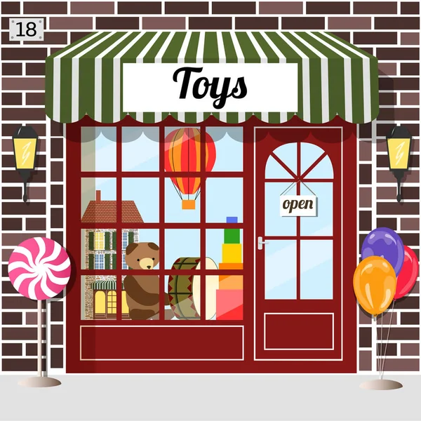 Brinquedos loja fachada de tijolo marrom . — Vetor de Stock