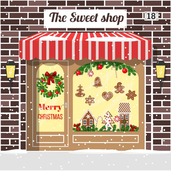 Christmas decorated and illuminated sweet shop — Stock Vector