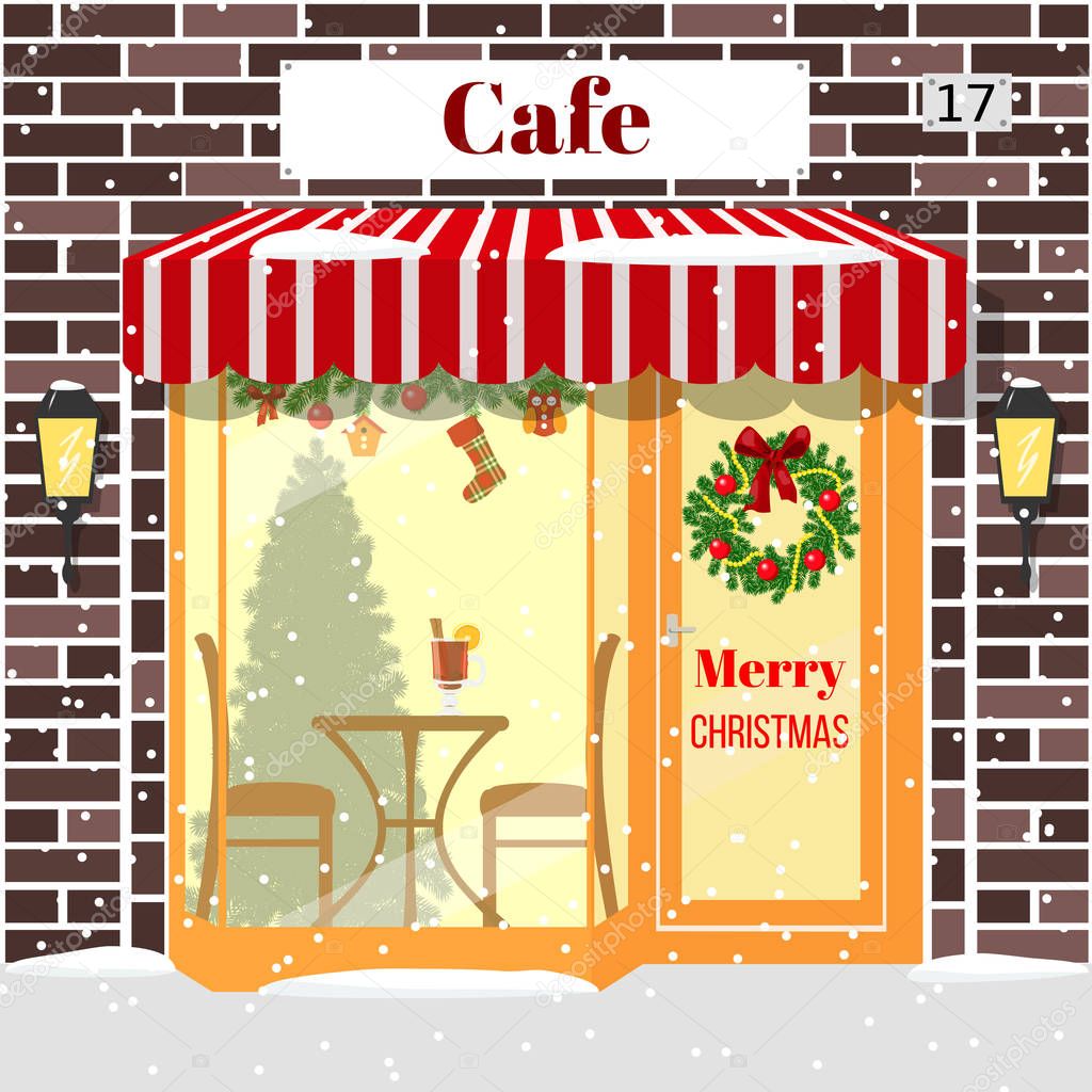 Christmas decorated Cafe or coffee shop. Building facade of red brick.