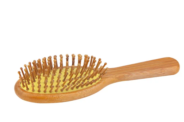 Wooden bamboo comb for hair care on white — Stock Photo, Image