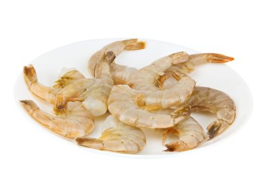 delicious appetizing prawns on white plate on white  clipart