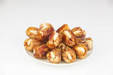 Lezzetli olgun incir plaka üzerinde yalan arka plan beyaz