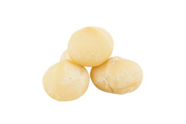 Ahşap zemin üzerinde lezzetli Macadamia fındıkları.