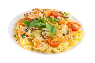 delicious fettuccine pasta with prawns on white plate clipart