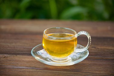green tea in beautiful cup clipart