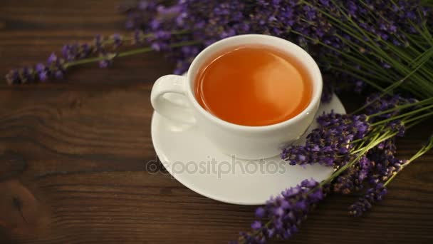 Delicious green tea in beautiful glass bowl on table — Stock Video