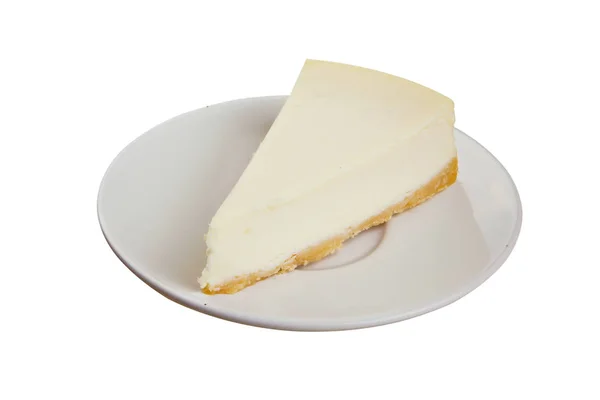 木製テーブルの上の白い皿に古典的なチーズケーキ — ストック写真